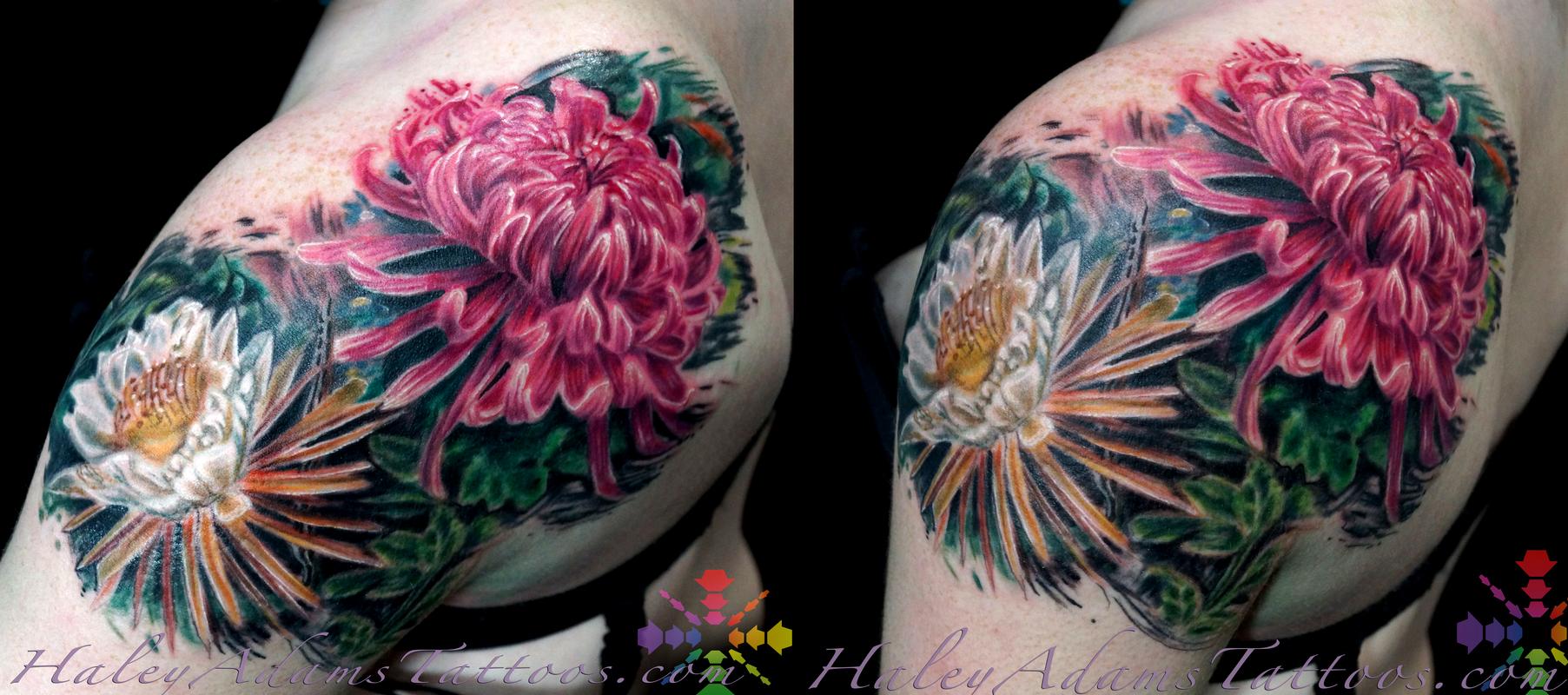 flowers on shoulder and upper arm by Haley Adams TattooNOW